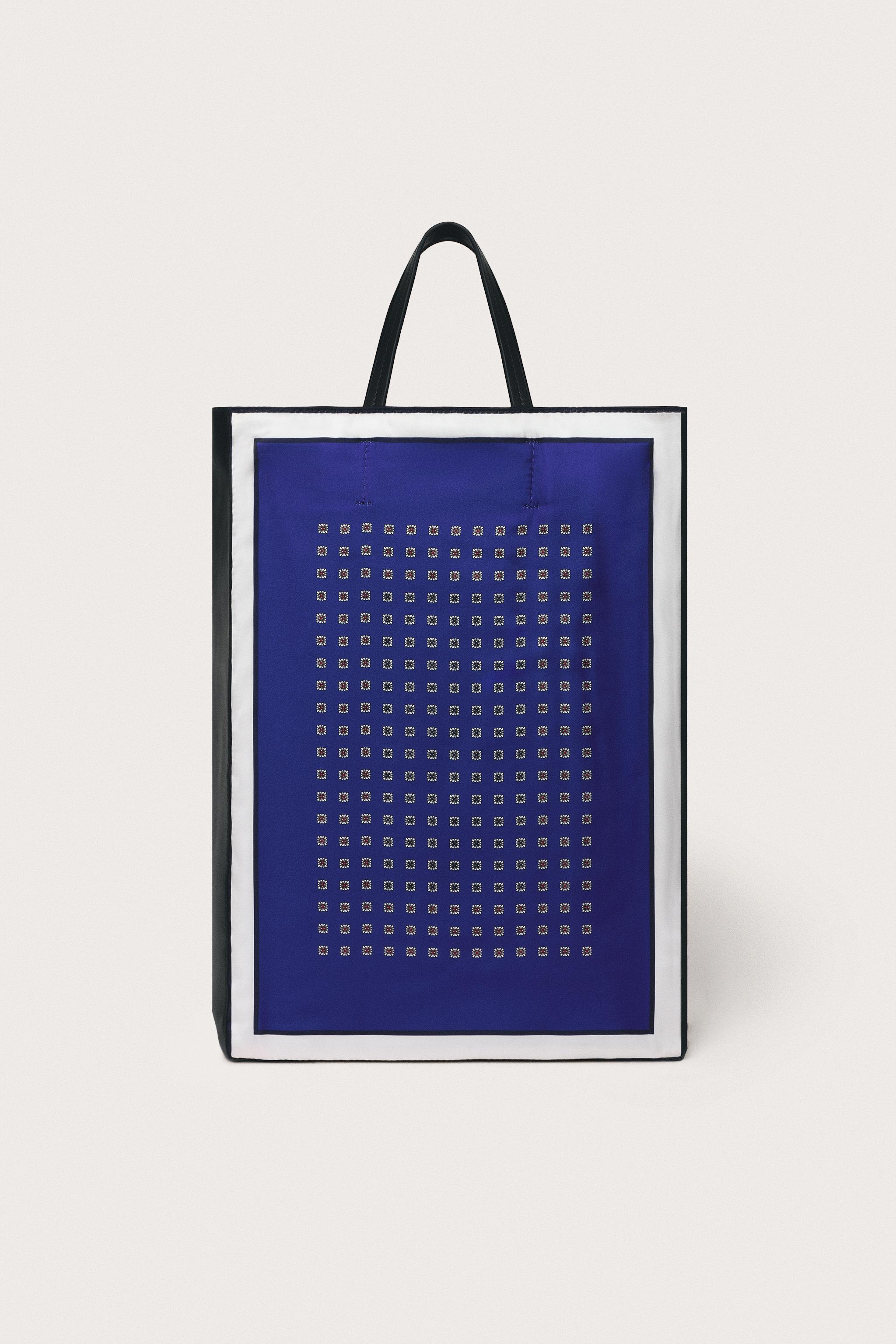 LIMITED EDITION LEATHER DETAIL HANDBAG